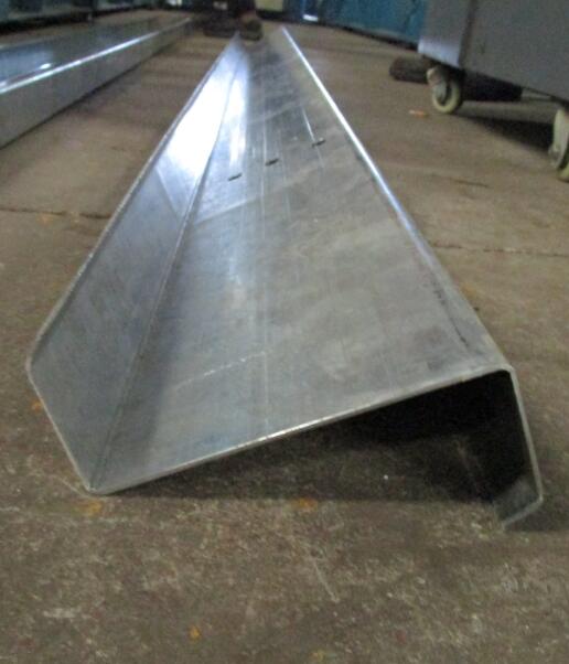 Ter&ccedil;a Z fora da m&aacute;quina formadora de rolos Ter&ccedil;a